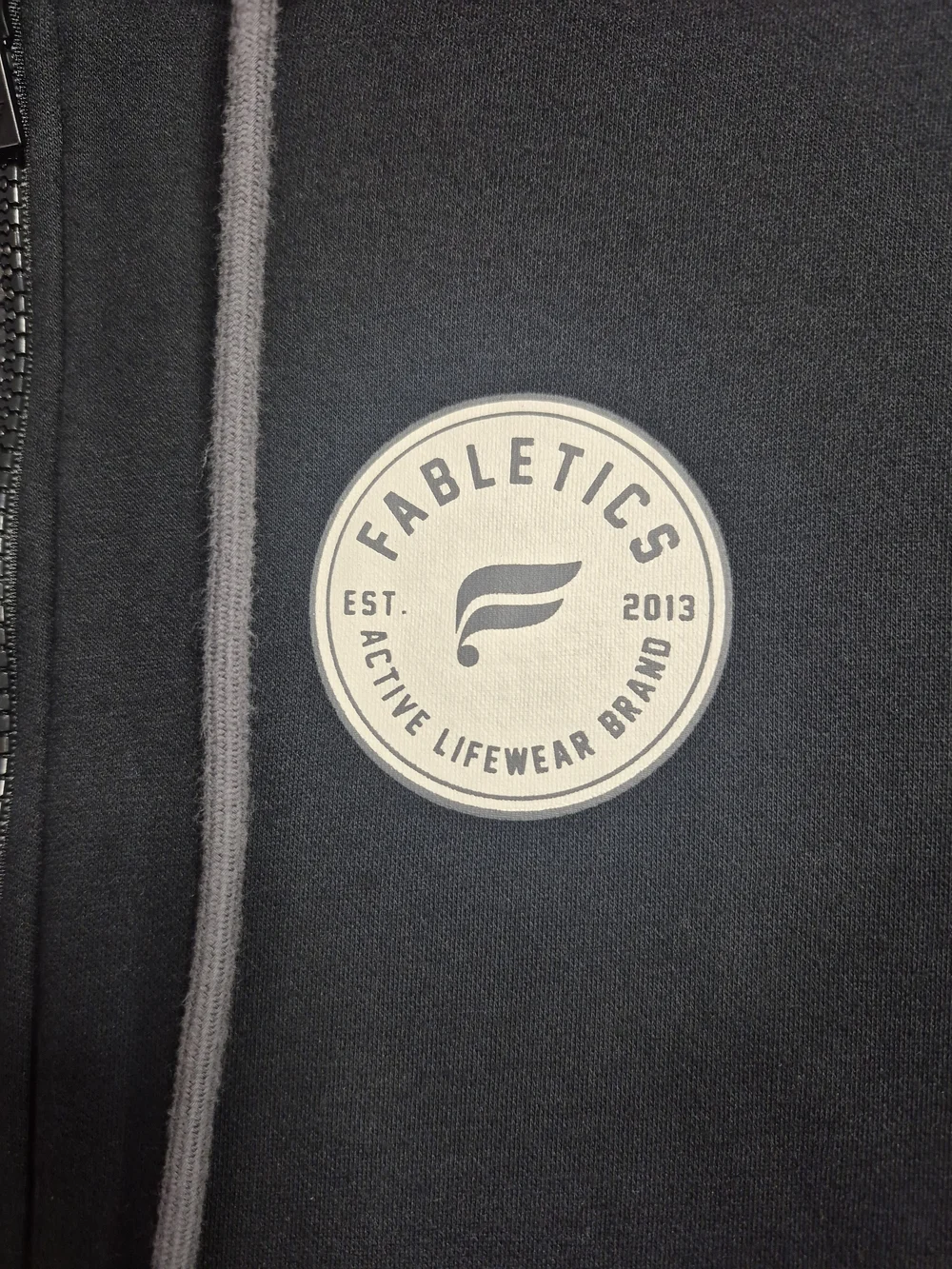 Fabletics Black Zip-Front Hoodie with White Brand Tag